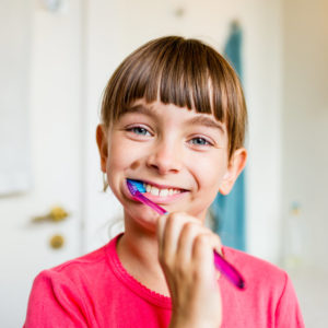girl brushing teeth dentistry for children montgomery AL wetumpka AL